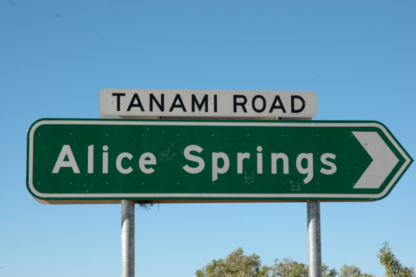 Image of road sign Alice Springs via Tanami Rd.